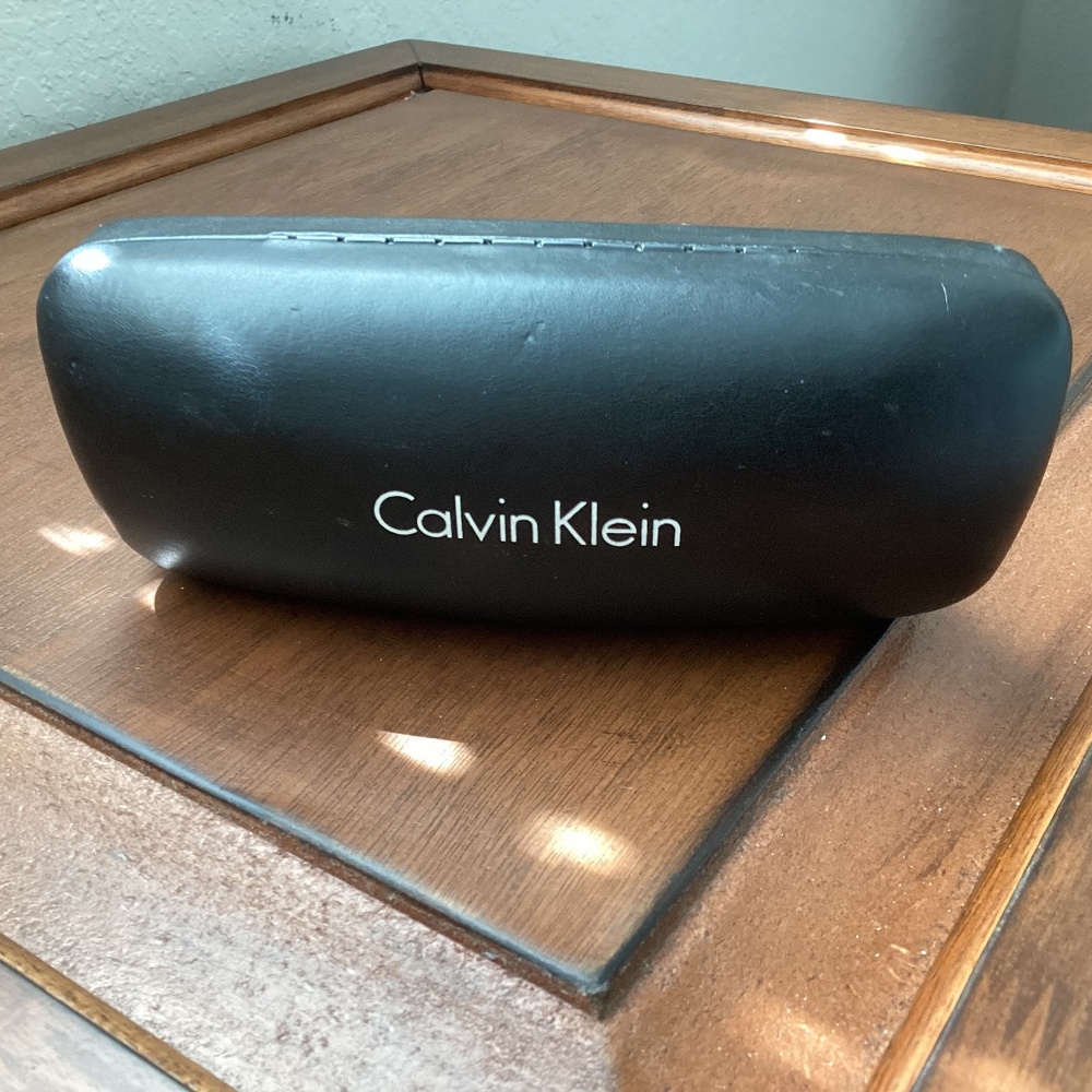 Black Calvin Klein glass case
